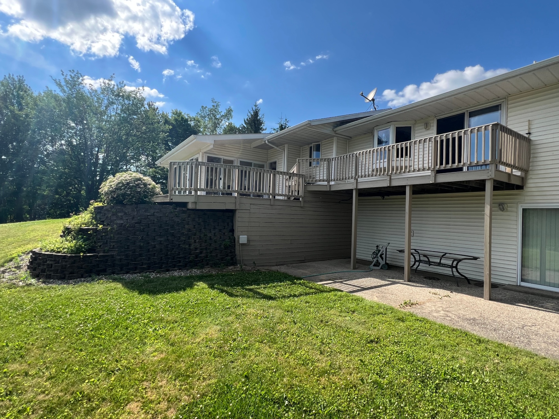 Repainted rear elevation with refreshed deck and trim